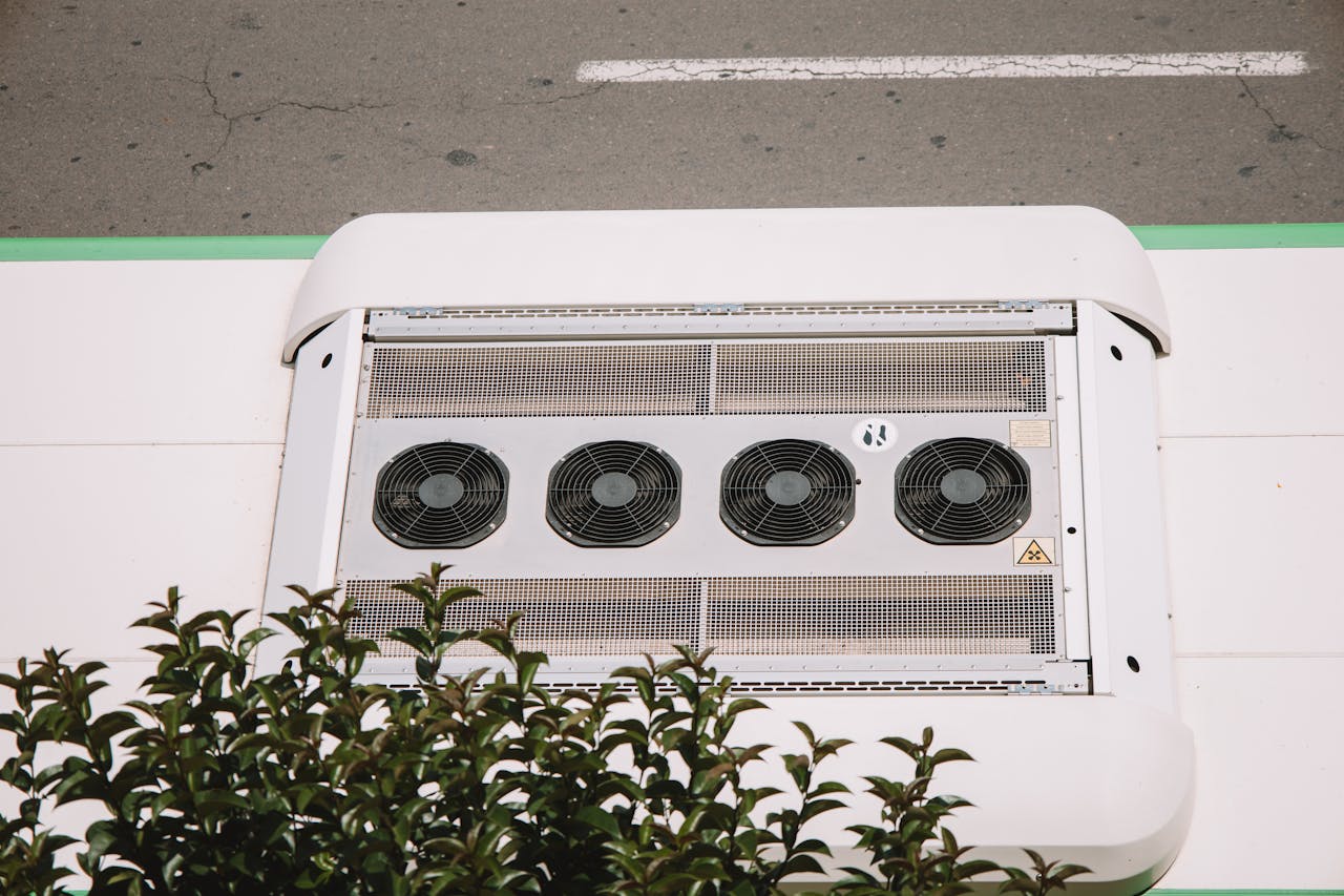 Aerial shot of air conditioning unit with fans on an industrial rooftop in Valencia.